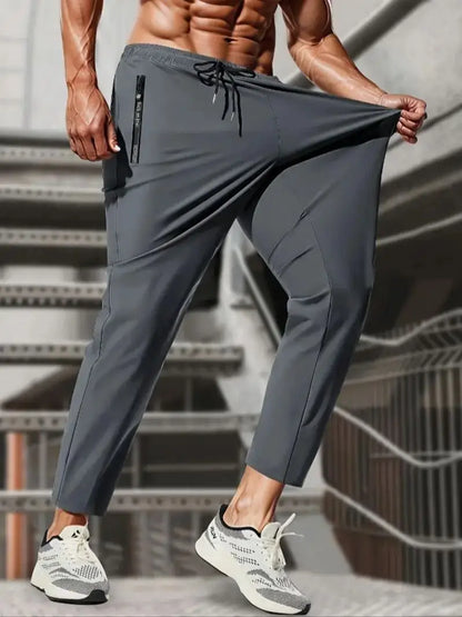 Men High Elasticity Ice Silky Joggers with Zipper Pockets Breathable Stretchy Athletic Pants for Running Gym and Outdoor Activit