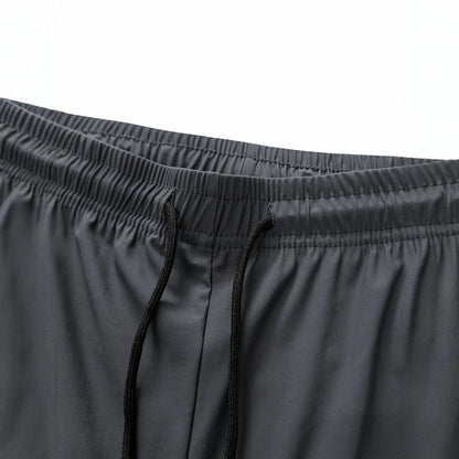 Men High Elasticity Ice Silky Joggers with Zipper Pockets Breathable Stretchy Athletic Pants for Running Gym and Outdoor Activit