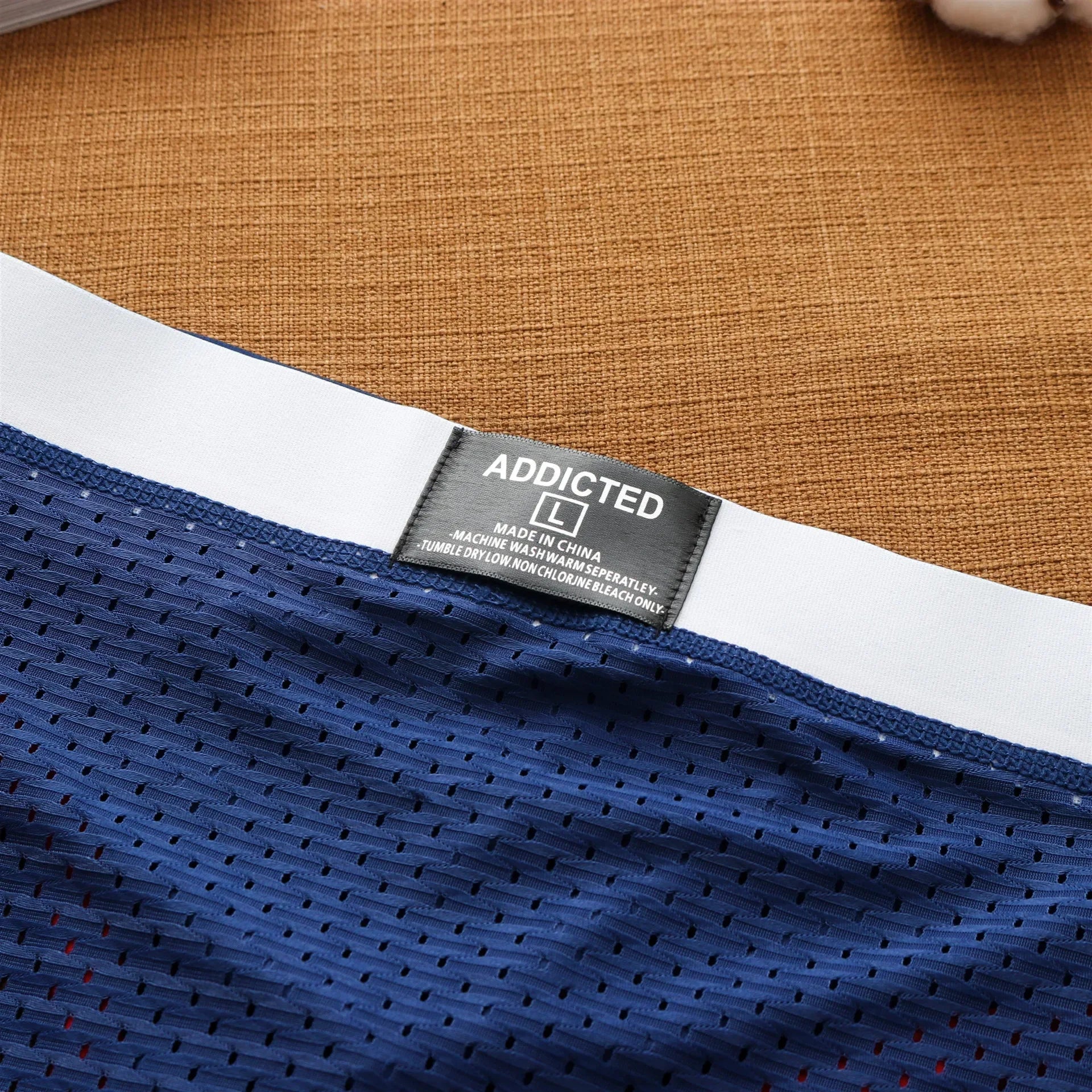 Mens low waist breathable ice mesh hole comfortable fashion briefs men