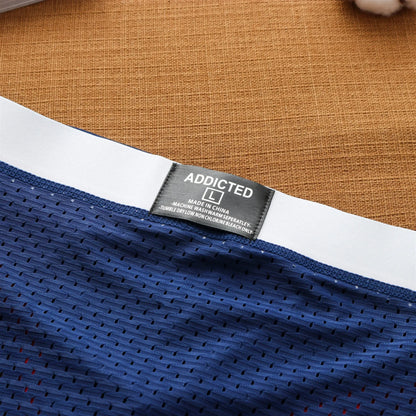 Mens low waist breathable ice mesh hole comfortable fashion briefs men